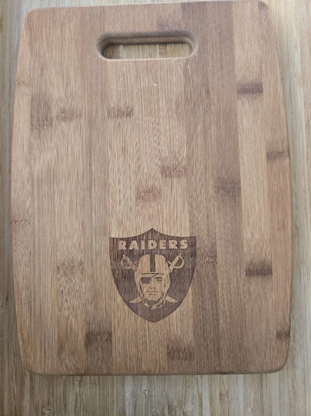 Engraved Oak Wood Cutting Cuttery Board with Raiders Logo